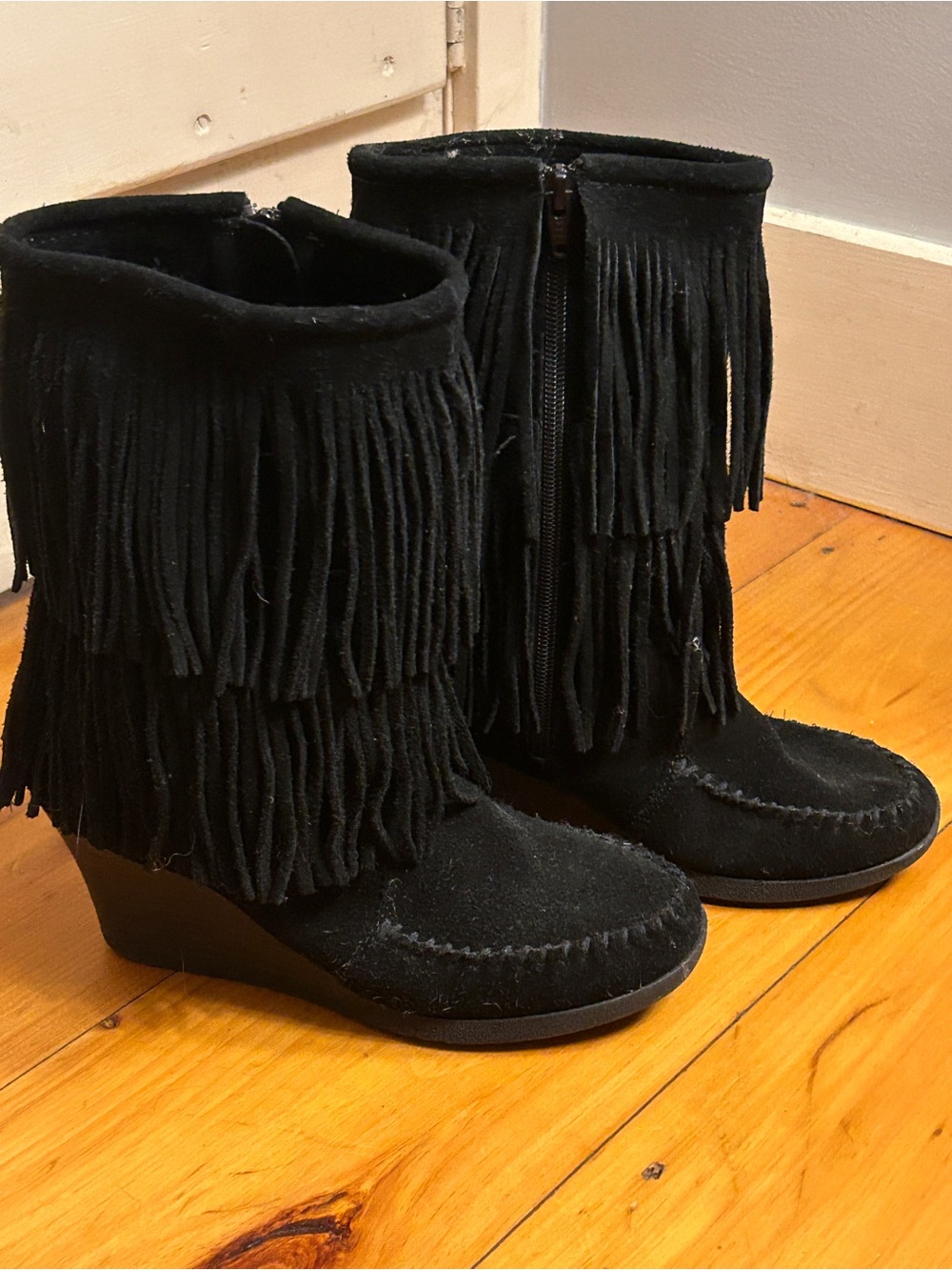 Minnetonka Black Suede Fringe Wedge Boots